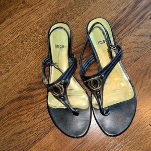 Impo Rollie black low heel thong sandals with gold details